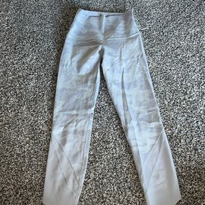 Grey and white camo Lululemon leggings with mesh bottoms. Size 4